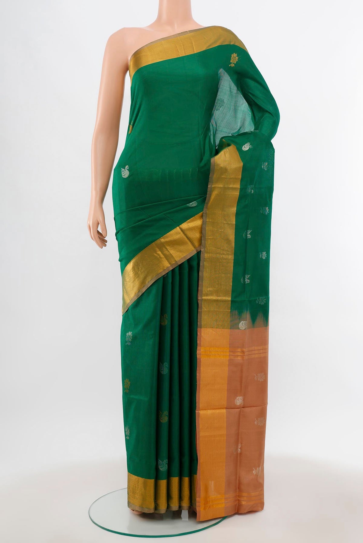 Light Green Uppada Silk Saree with Zari Butta on the body and Silk Border.  displayed on a mannequin