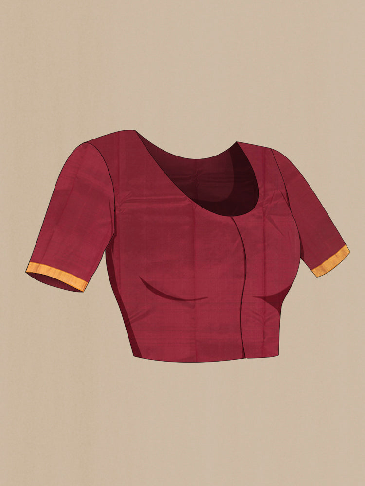 Close up image of the blouse of Pure Silk Pure Zari Maroon Kanchipuram Saree with Zari Butta on the body and Silk Border. 