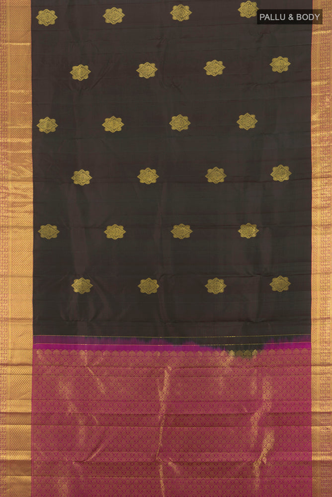 Flat view of Black Kanchipuram Silk Saree with Zari Butta on the body and Zari Border. 