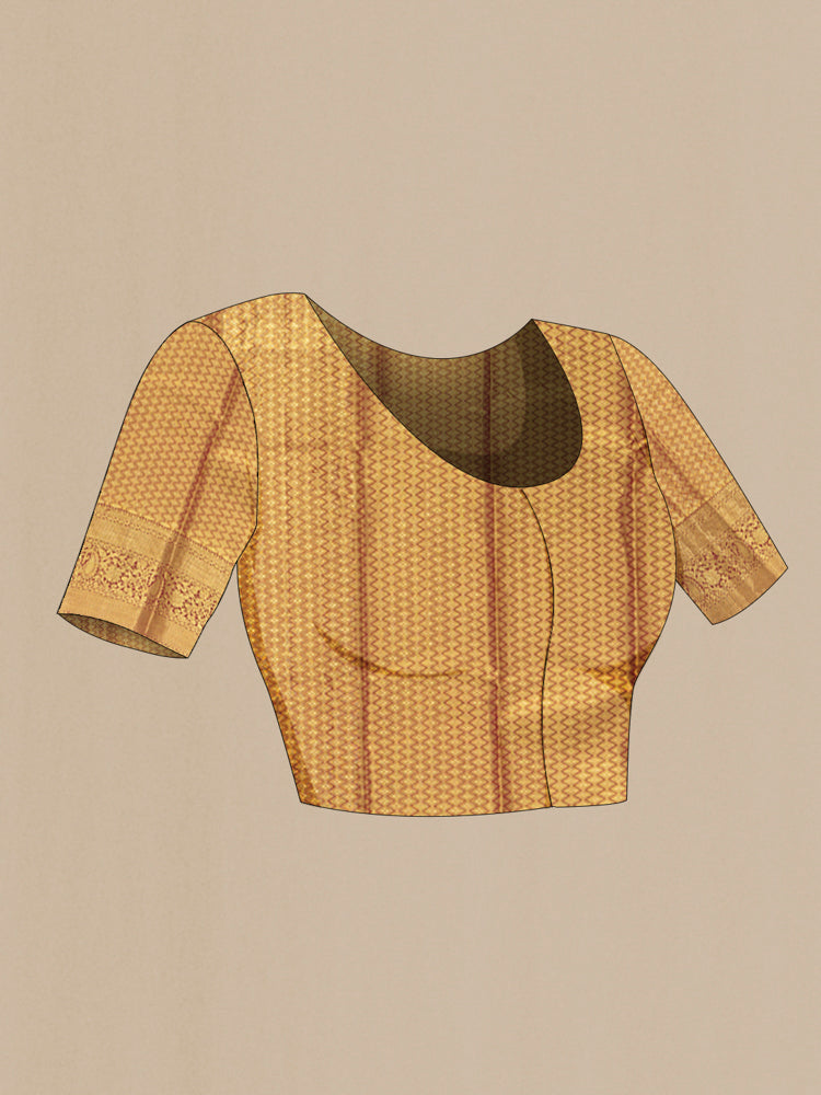 Close up image of the blouse of Golden Kanchipuram Silk Saree with Zari Butta on the body and Zari Border. 