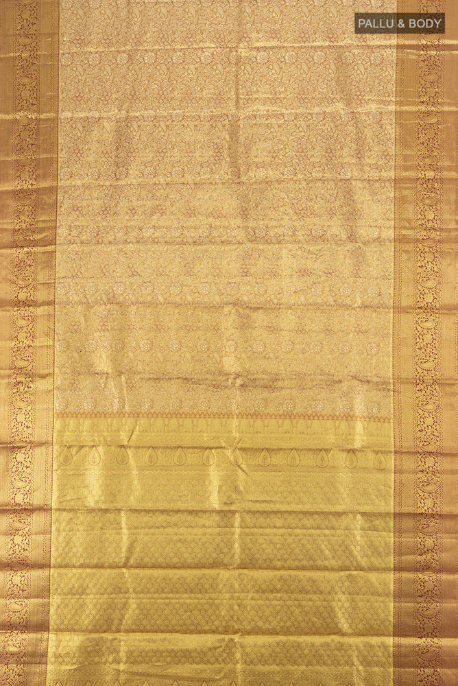 Flat view of Golden Kanchipuram Silk Saree with Zari Butta on the body and Zari Border. 