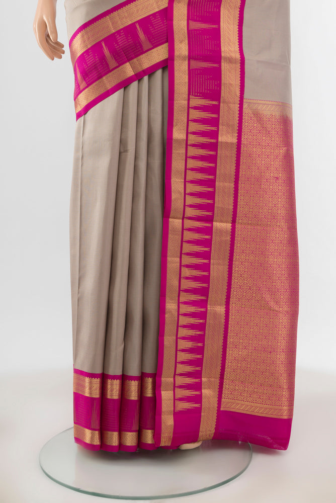 Pleats and pallu of Grey Kanjivaram Silk Saree with Stripes on the body and Zari Border. 