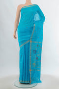 Light Blue Uppada Silk Saree with Zari Butta on the body and Silk Border.  displayed on a mannequin