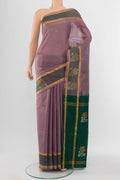 Bronze Uppada Silk Saree with Zari Butta on the body and Silk Border.  displayed on a mannequin
