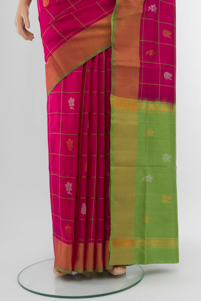Pleats and pallu of Magenta Uppada Silk Saree with Zari Brocade on the body and Silk Border. 