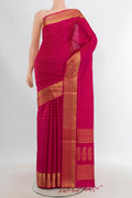 Dark Pink Soft Silk Saree with Jacquard design on the body and Zari Border.  displayed on a mannequin