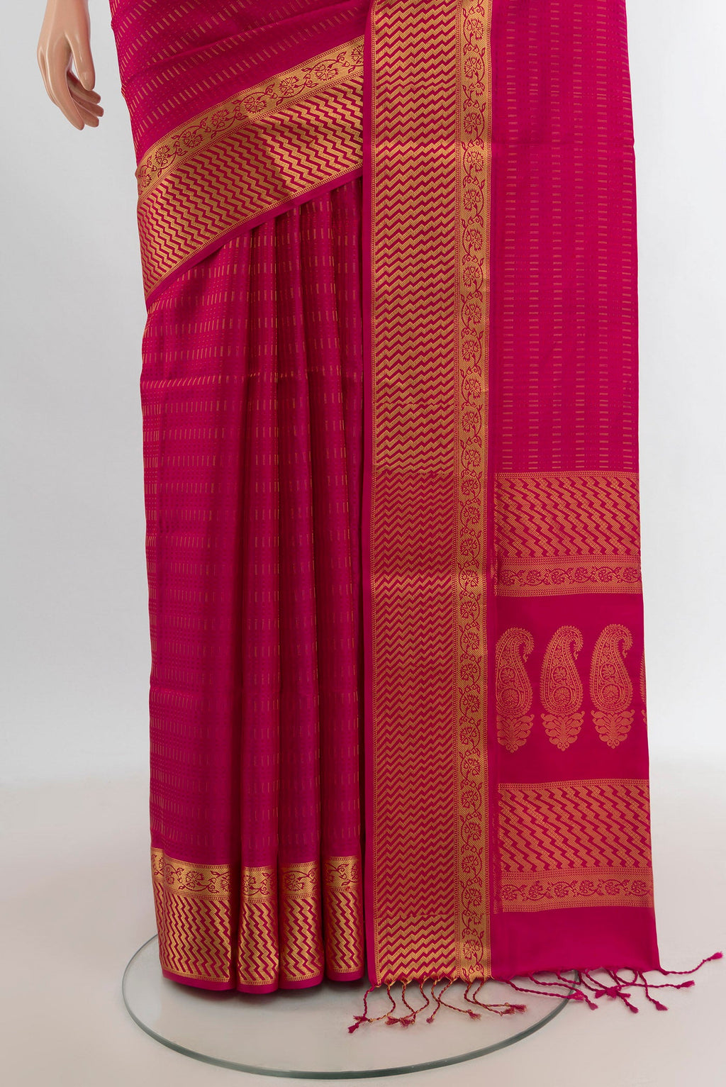 Pleats and pallu of Dark Pink Soft Silk Saree with Jacquard design on the body and Zari Border. 