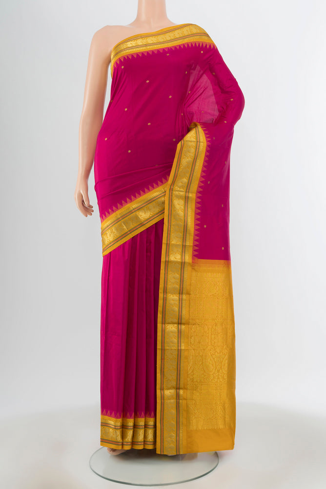 Dark Pink Bangalore Silk Saree with Zari Butta on the body and Zari Border.  displayed on a mannequin