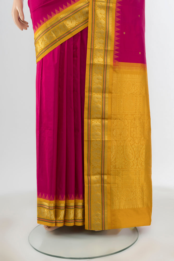 Pleats and pallu of Dark Pink Bangalore Silk Saree with Zari Butta on the body and Zari Border. 