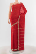 Red Mysore Crepe Saree with Plain Body and Silk Border.  displayed on a mannequin