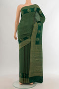 Bottle Green Mysore Crepe Saree with Zari Brocade on the body and Zari Border.  displayed on a mannequin