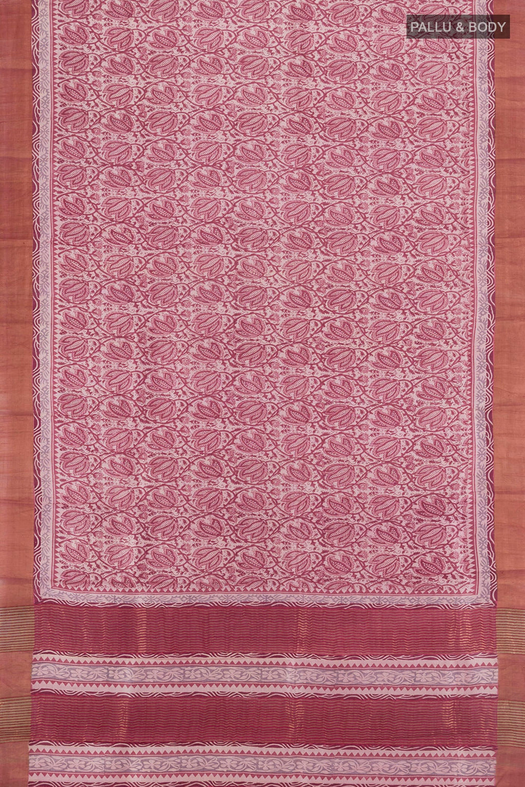 Flat view of Dark Mauve Tussar Silk Saree with Printed design on the body and Zari Border. 