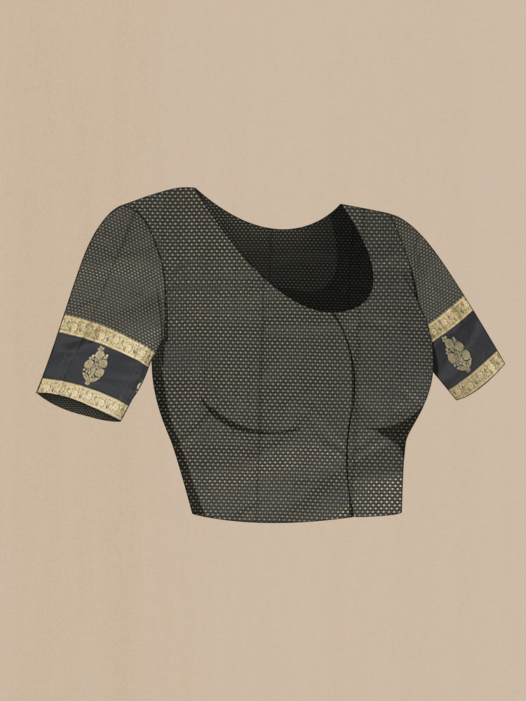 Close up image of the blouse of Pure Silk Pure Zari Black Kanchipuram Saree with Zari Butta on the body and Silk Border. 