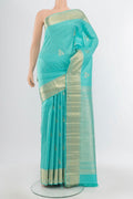 Pure Silk Pure Zari Sky Blue Kanjivaram Saree with Zari Butta on the body and Silk Border.  displayed on a mannequin