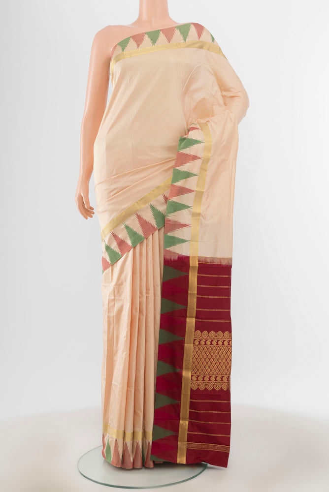 Cream Bangalore Silk - kadyal Saree with Plain Body and Temple Border.  displayed on a mannequin