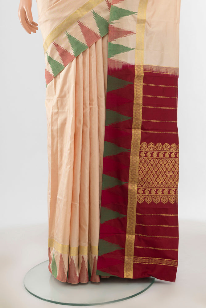 Pleats and pallu of Cream Bangalore Silk - kadyal Saree with Plain Body and Temple Border. 