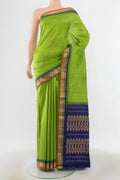 Parrot Green Bangalore Silk - kadyal Saree with Plain Body and Silk Border.  displayed on a mannequin