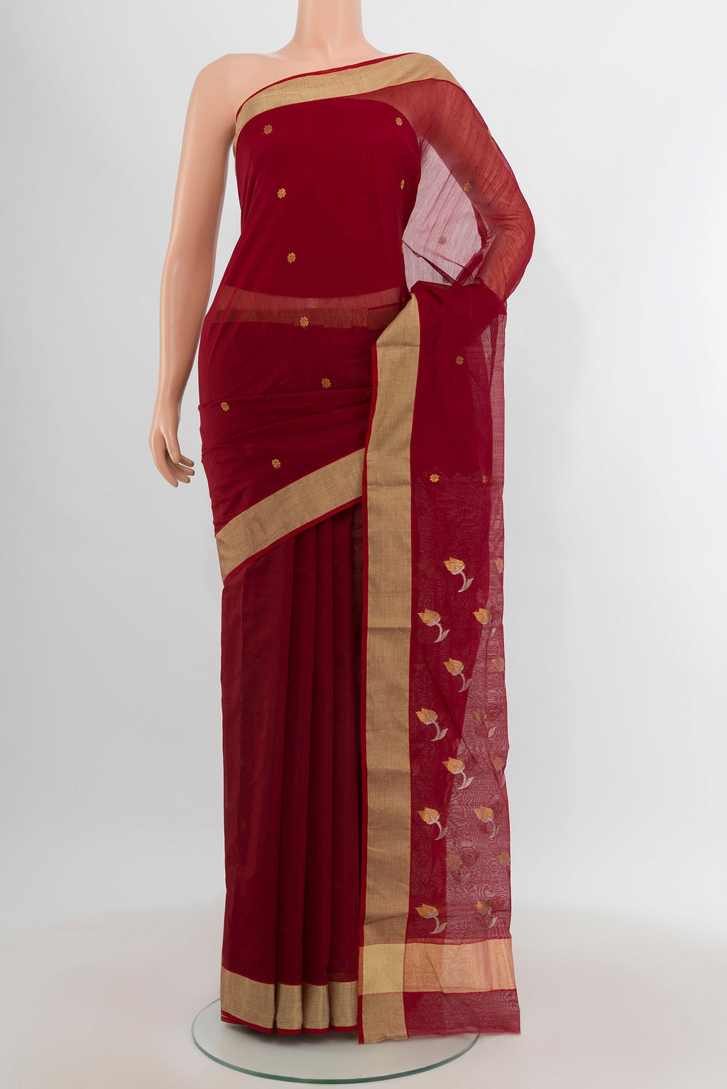 Maroon Chanderi Silk Cotton Saree with Zari Butta on the body and Zari Border.  displayed on a mannequin