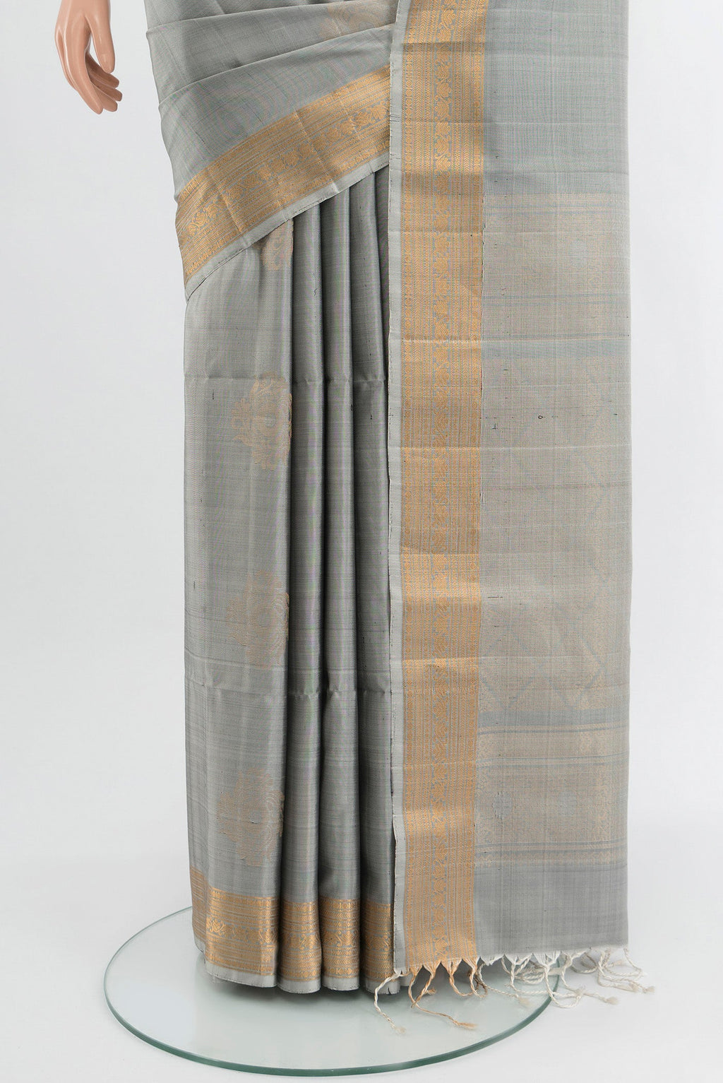 Pleats and pallu of Davys Grey Soft Silk Saree with Zari Butta on the body and Zari Border. 