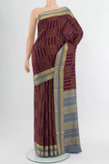Coffee Brown Mysore Crepe Saree with Checked design on the body and Zari Border.  displayed on a mannequin