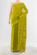 Light Green Uppada Silk Saree with Zari Brocade on the body and Silk Border.  displayed on a mannequin