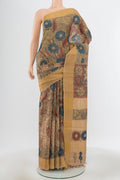 Pure Silk Pure Zari Multi Color Tussar Saree with kalamkari Print on the body and Silk Border.  displayed on a mannequin