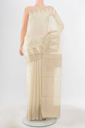 Pure Silk Pure Zari Cream Tussar Saree with Zari Butta on the body and Silk Border.  displayed on a mannequin