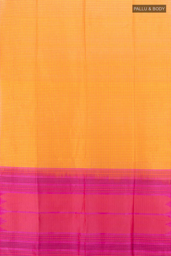 Flat view of Yellow Silk Cotton Saree with Checked design on the body and Zari Border. 