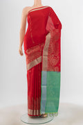 Red Soft Silk Saree with Zari Butta on the body and Silk Border.  displayed on a mannequin