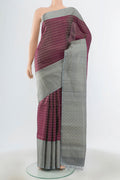 Purple Soft Silk Saree with Zari Butta on the body and Silk Border.  displayed on a mannequin