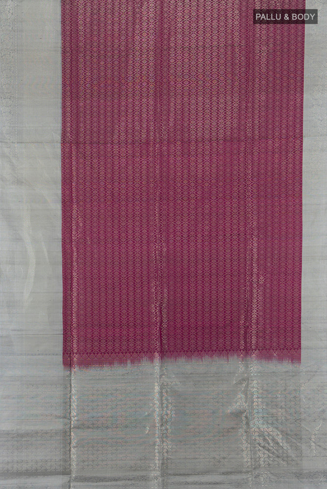 Flat view of Purple Soft Silk Saree with Jacquard design on the body and Zari Border. 