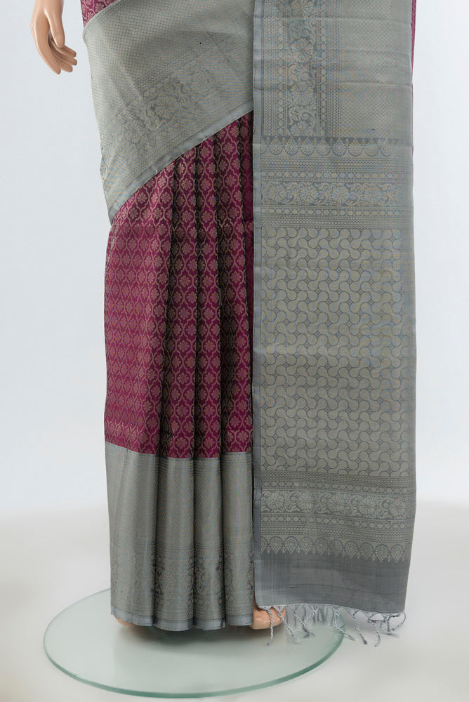 Pleats and pallu of Purple Soft Silk Saree with Jacquard design on the body and Zari Border. 