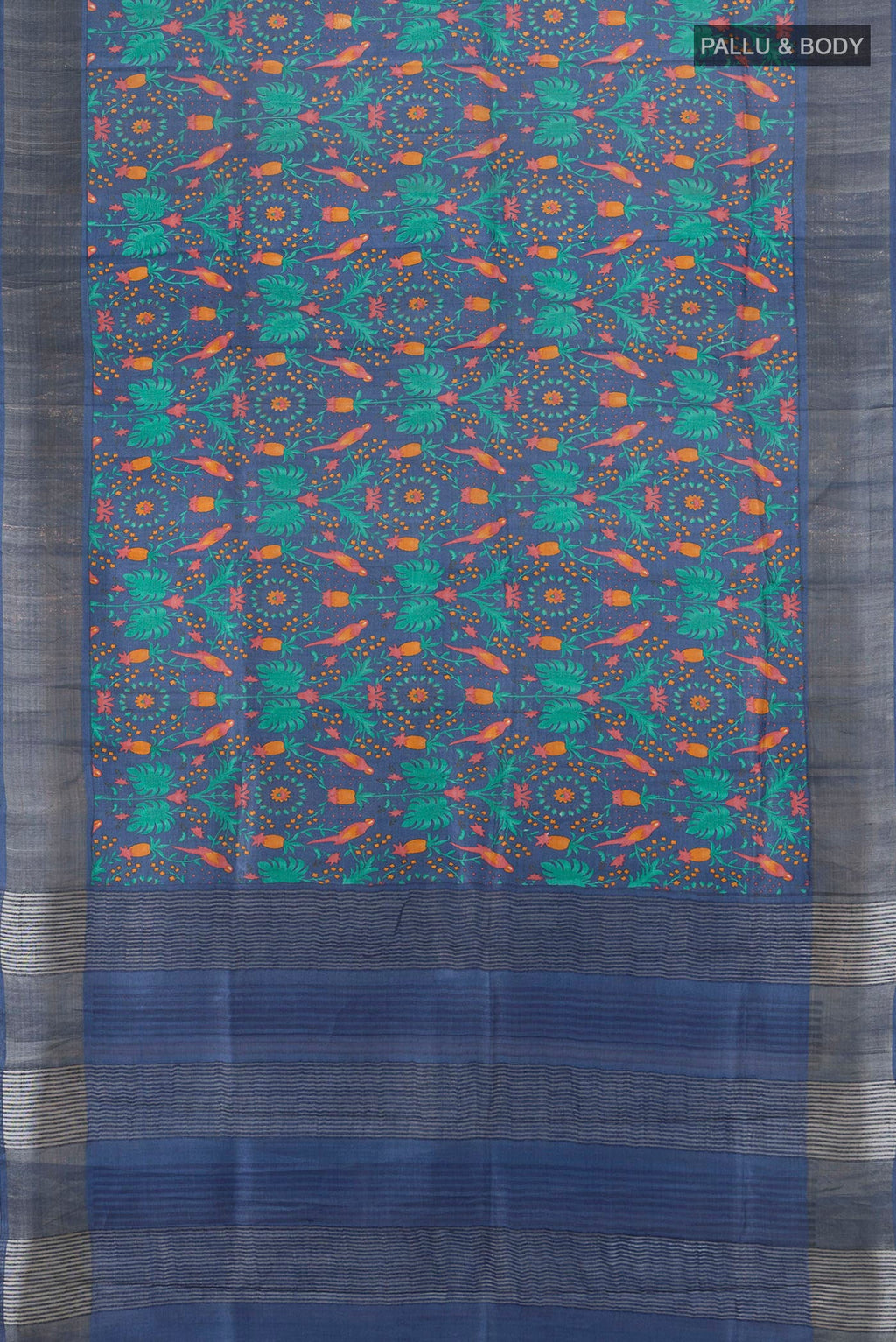 Flat view of Blue Tussar Silk Saree with Floral Print on the body and Zari Border. 