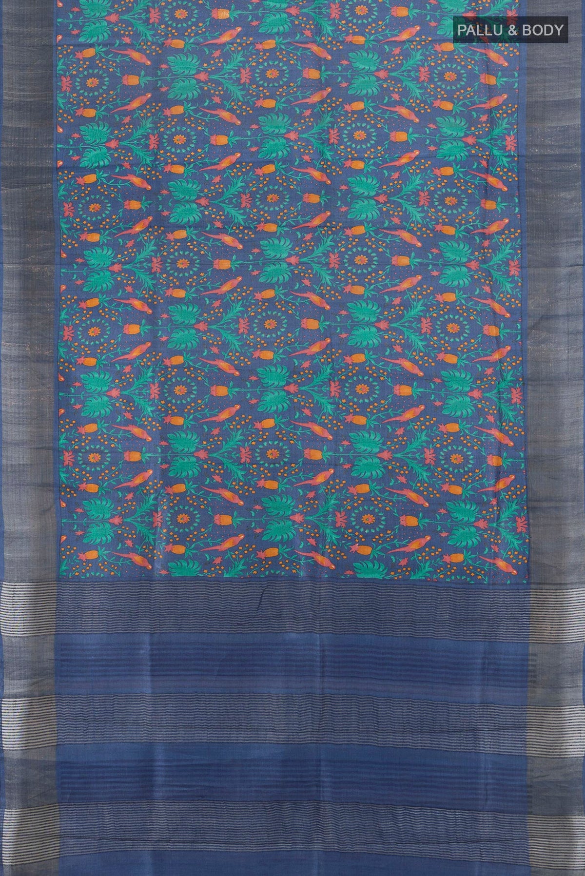 Flat view of Blue Tussar Silk Saree with Floral Print on the body and Zari Border. 