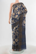 Pure Silk Pure Zari Multi Color Tussar Saree with Floral Print on the body and Silk Border.  displayed on a mannequin