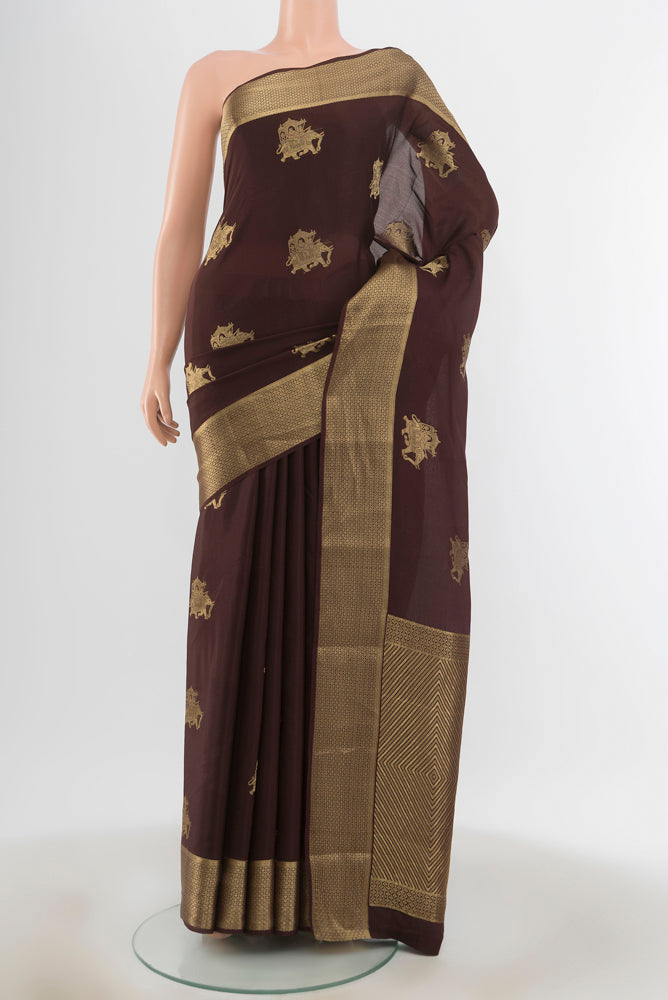 Coffee Brown Mysore Crepe Saree with Zari Butta on the body and Zari Border.  displayed on a mannequin