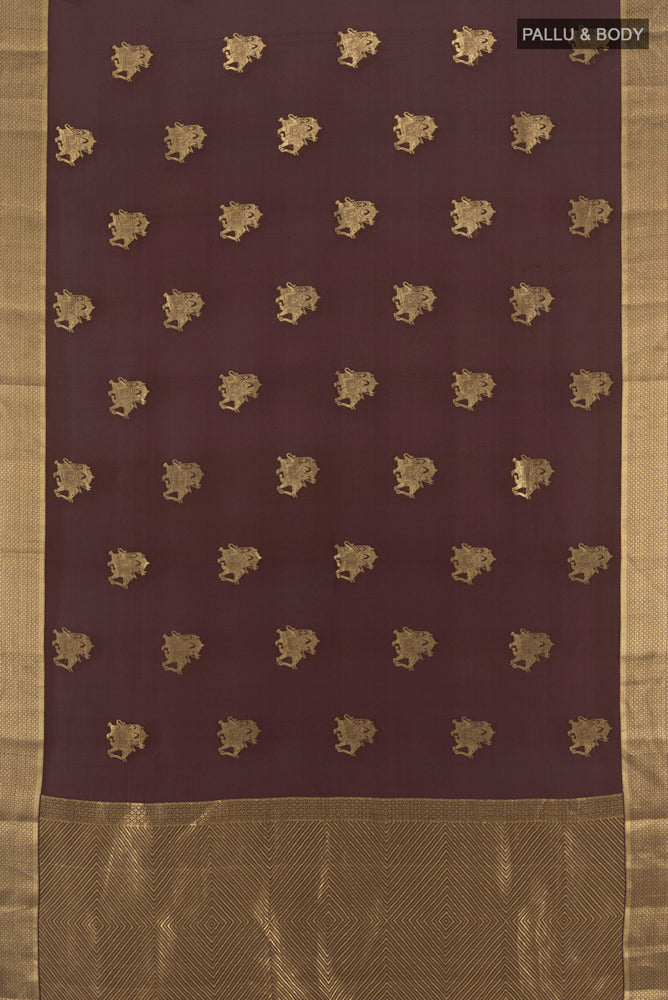 Flat view of Coffee Brown Mysore Crepe Saree with Zari Butta on the body and Zari Border. 