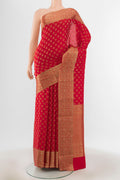 Red Georgette Saree with Zari Butta on the body and Silk Border.  displayed on a mannequin