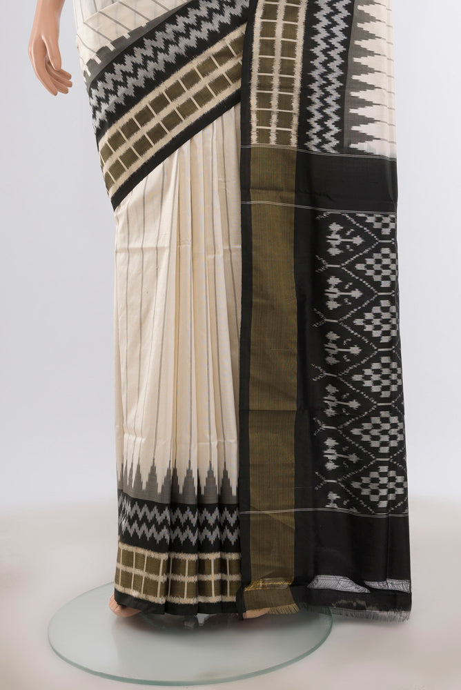 Pleats and pallu of Off White Pochampally Silk Saree with Stripes on the body and Ikat Border. 