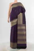 Violet Kanchipuram Silk Saree with Zari Butta on the body and Silk Border.  displayed on a mannequin