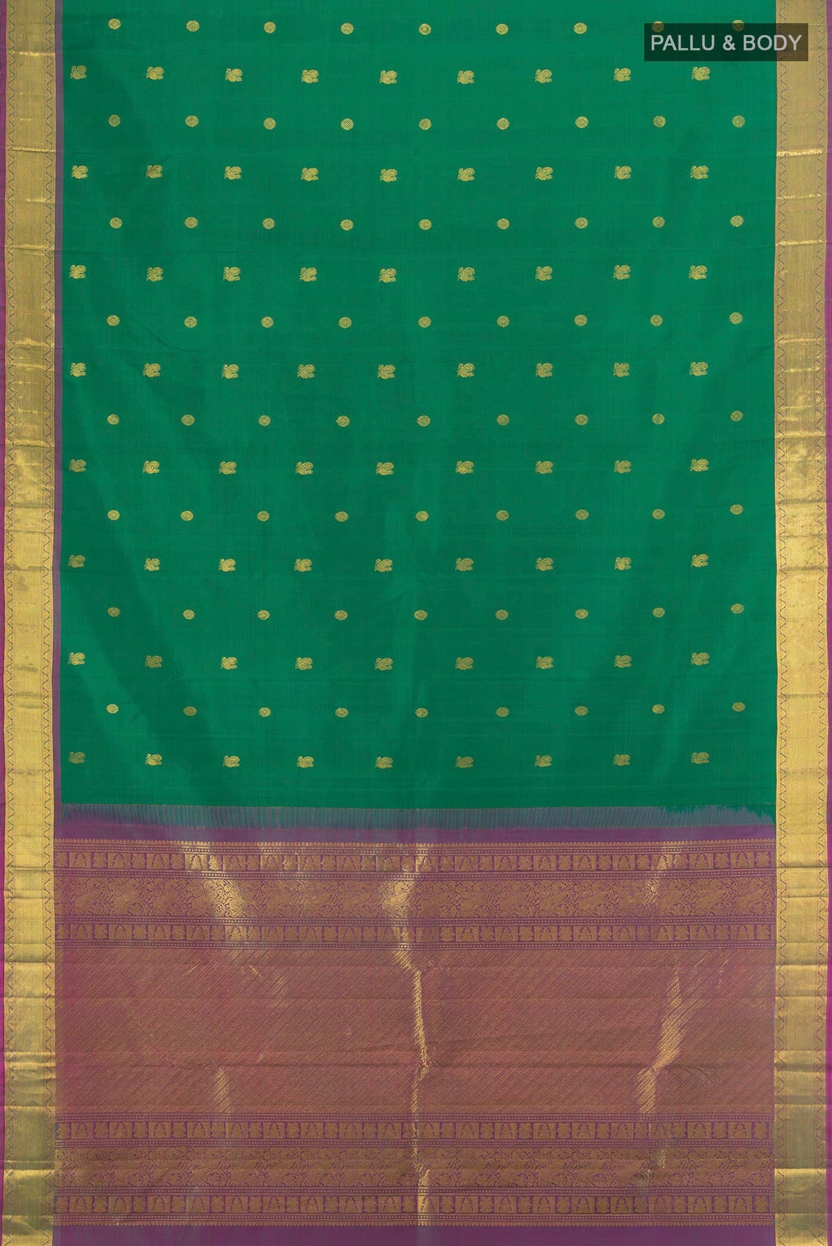 Flat view of Green Kanjivaram Silk Saree with Zari Butta on the body and Zari Border. 