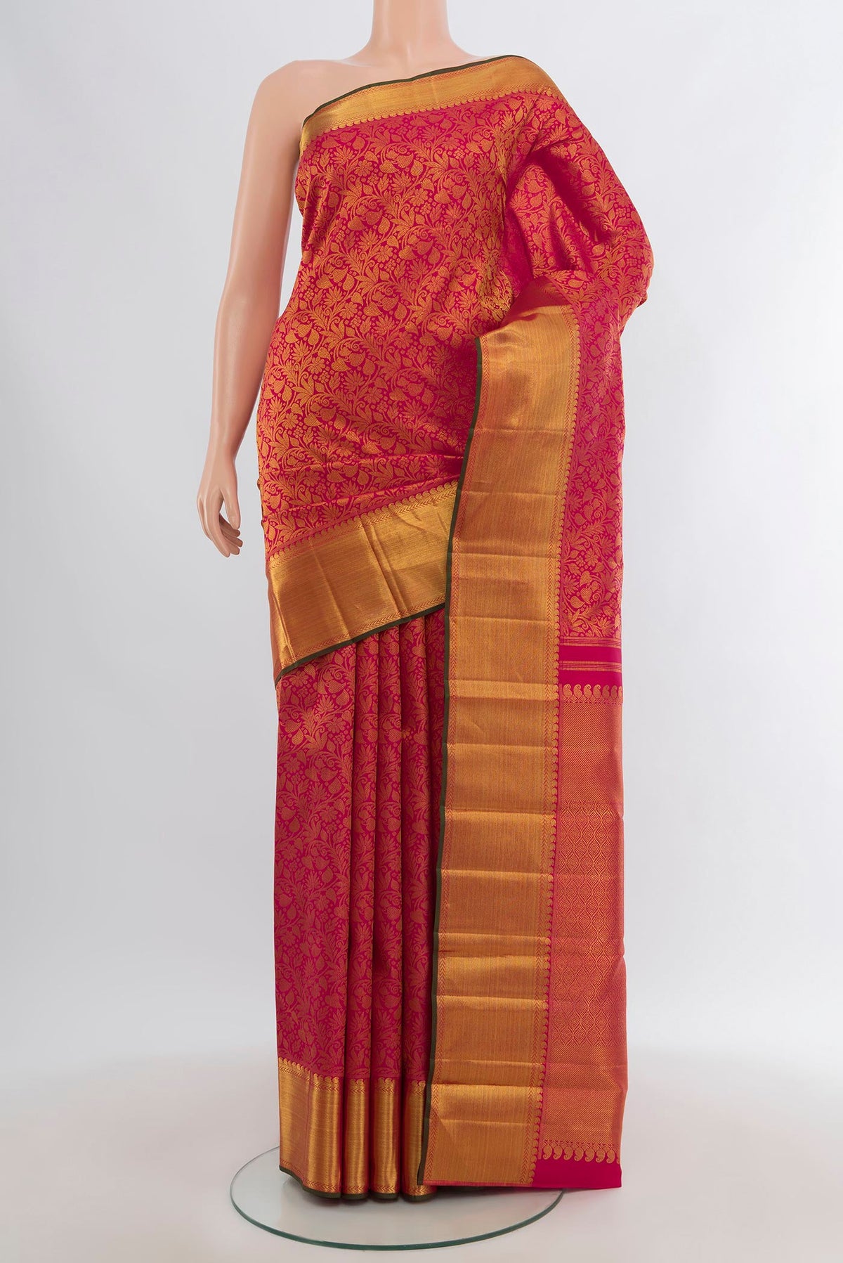 Pure Silk Pure Zari Pink Kanjivaram Saree with Zari Brocade on the body and Zari Border.  displayed on a mannequin