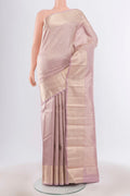 Pure Silk Pure Zari Lavender Kanjivaram Saree with Zari Butta on the body and Silk Border.  displayed on a mannequin
