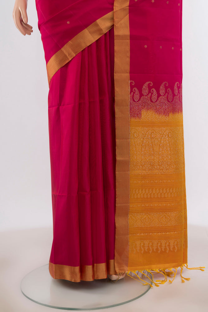 Pleats and pallu of Pink Soft Silk Saree with Zari Butta on the body and Zari Border. 