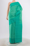 Turquoise Soft Silk Saree with Zari Butta on the body and Plain Border.  displayed on a mannequin