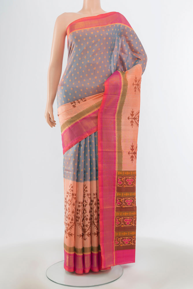 Light Blue with Pink Color Rajkot Patola Silk Saree with Pure Ikat on the body and Ikat Border.  displayed on a mannequin