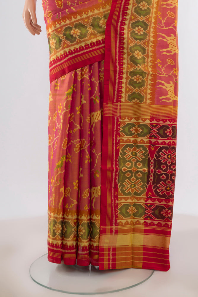 Pleats and pallu of Pinkish Yellow Dual Tone Rajkot Patola Silk Saree with Pure Ikat on the body and Ikat Border. 