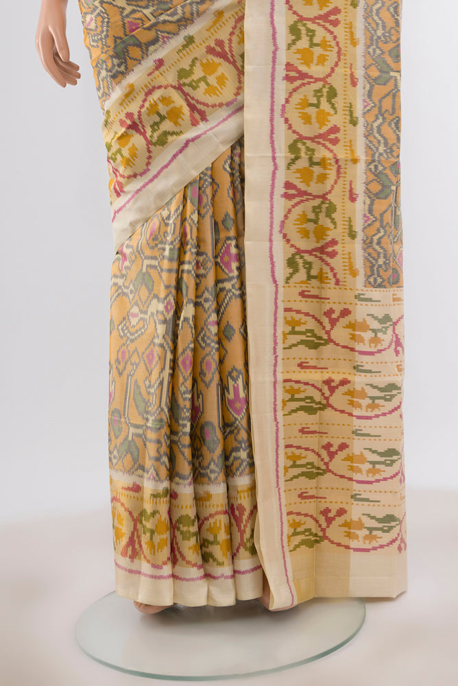 Pleats and pallu of Multi Color Rajkot Patola Silk Saree with Pure Ikat on the body and Ikat Border. 