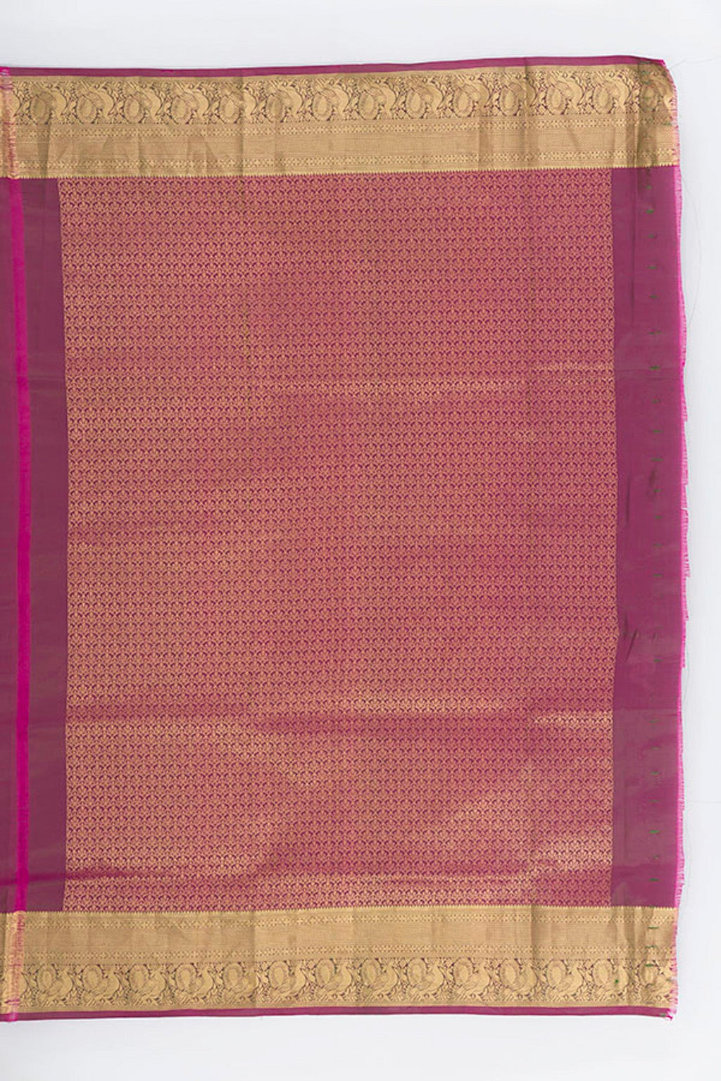 Close up image of the blouse of Mint Green Soft Silk Saree with Zari Butta on the body and Silk Border. 