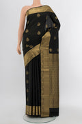 Black Soft Silk Saree with Zari Butta on the body and Silk Border.  displayed on a mannequin